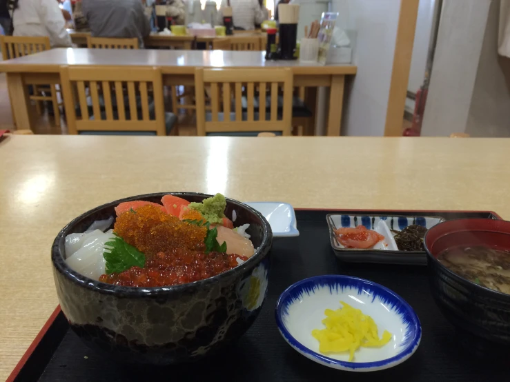 this is an image of a bowl filled with rice and meat