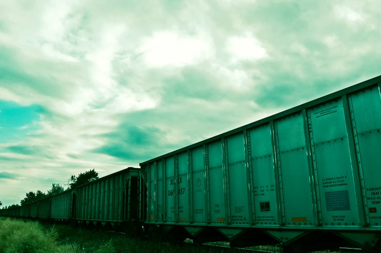 a long train that is sitting on the tracks