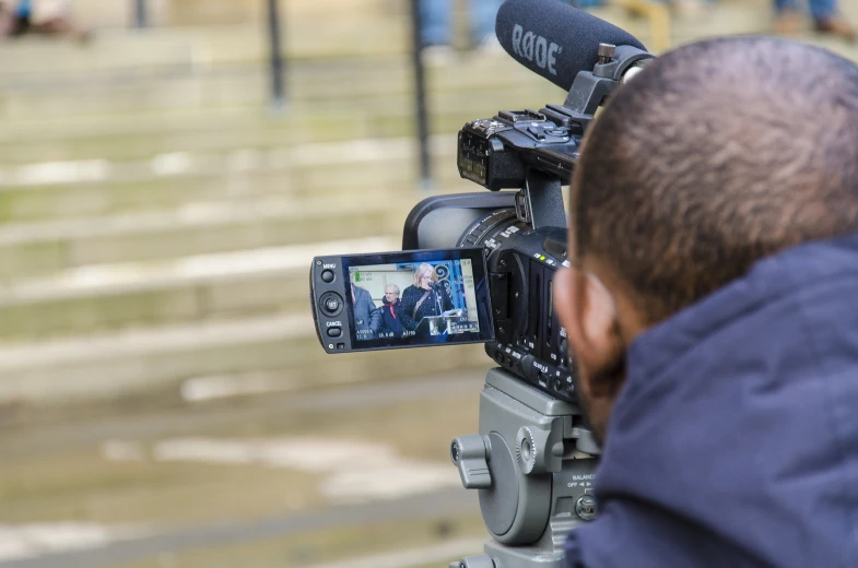 someone taking a po of the scene on a video camera