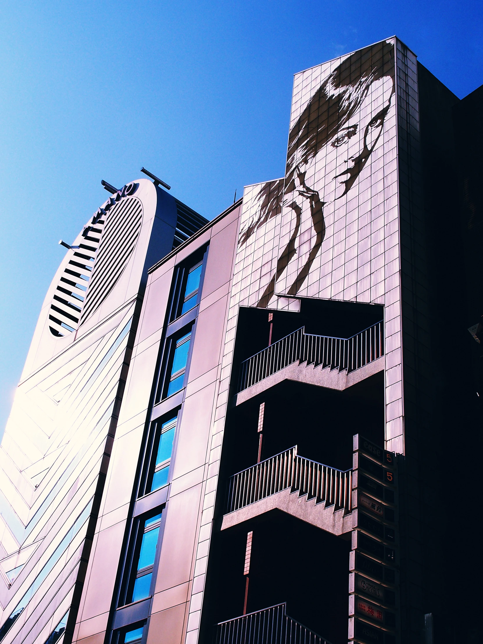 a black building with a clock on it