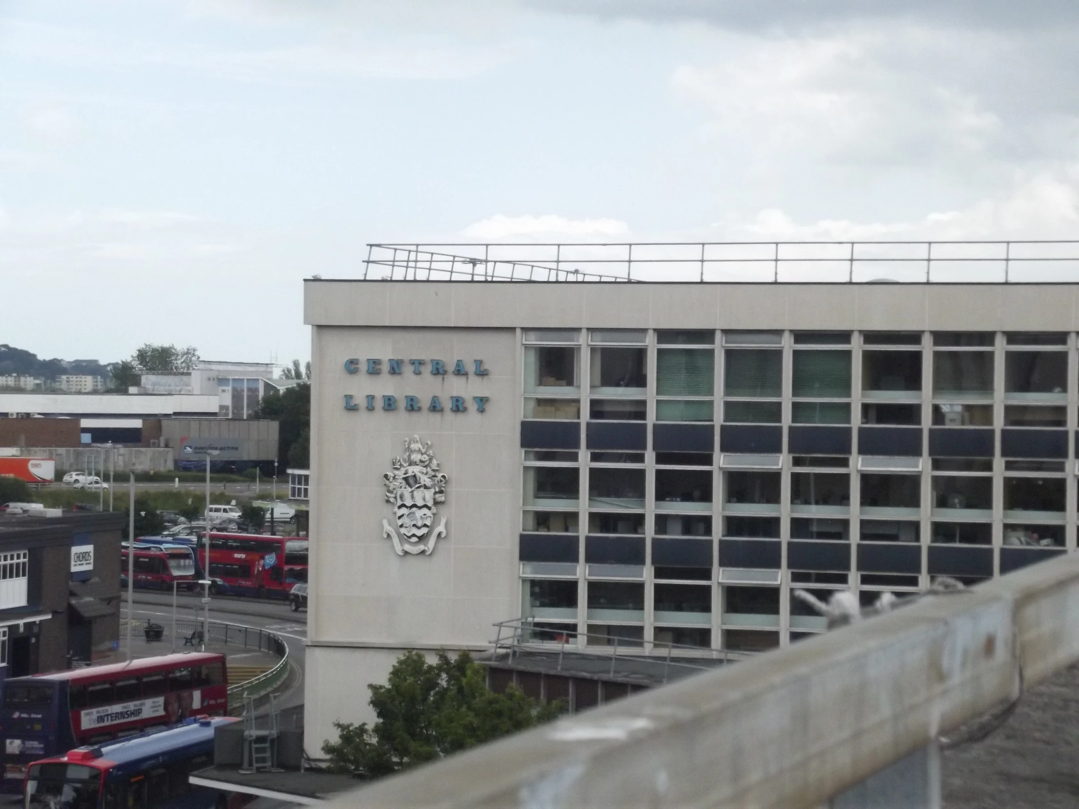 a white building with a sign in front