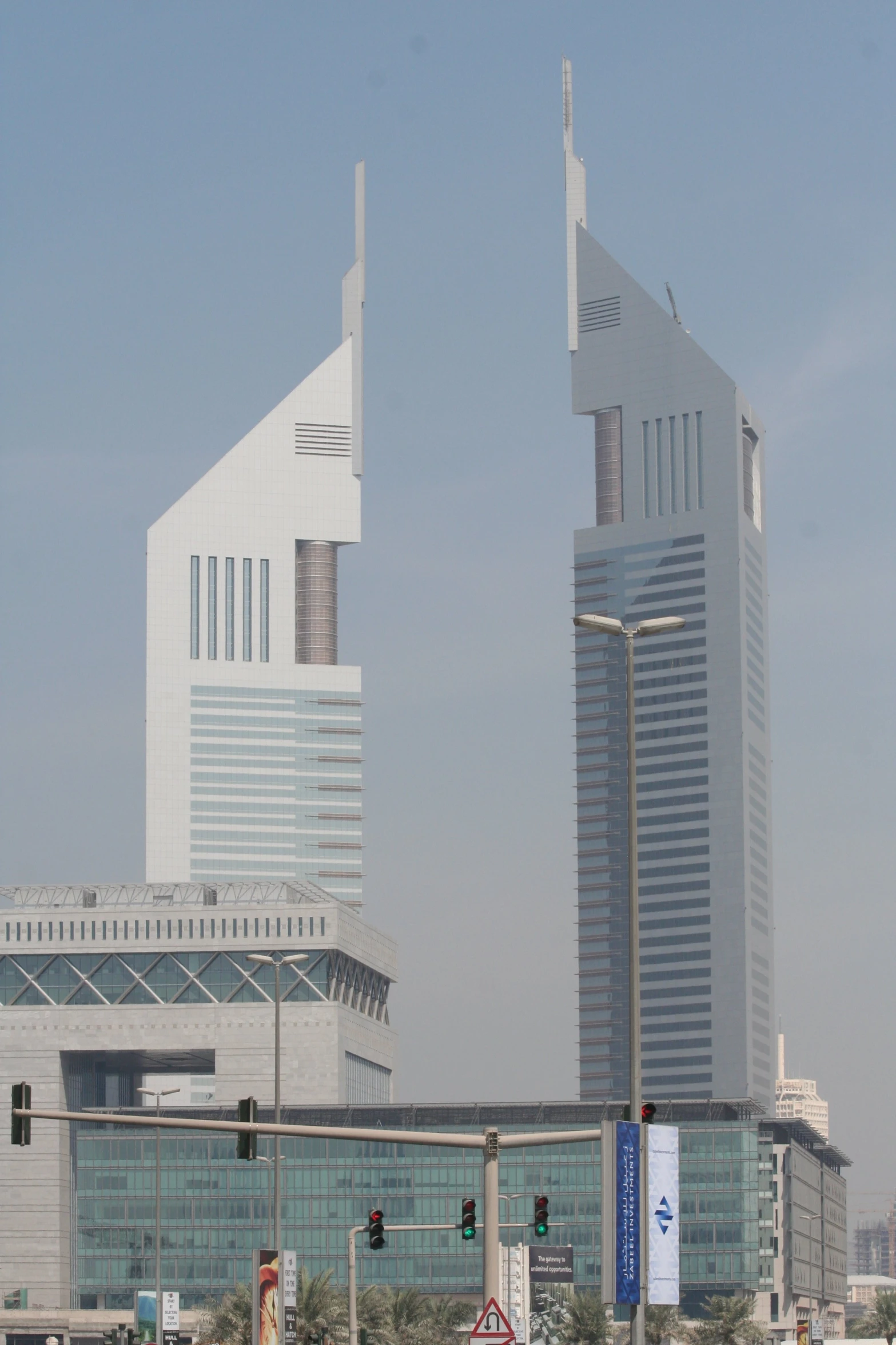 looking down at the tall buildings on either side of them