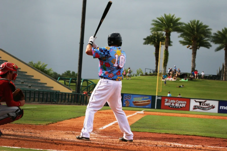 there is a male baseball player at bat