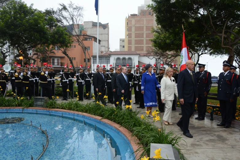 a crowd of people in uniforms standing next to each other