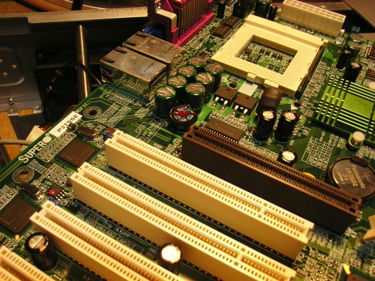 several components are being assembled into a computer