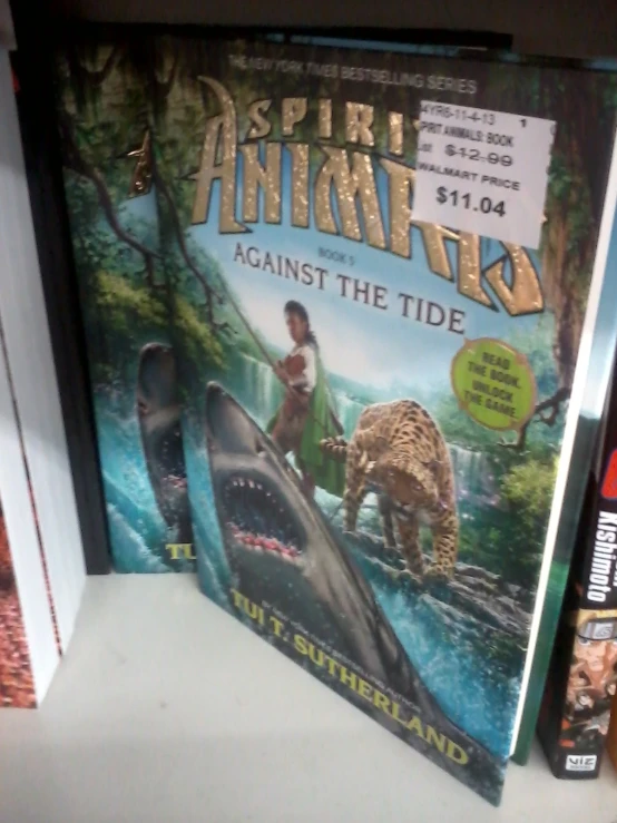 book's cover, showing a cartoon character on a shark