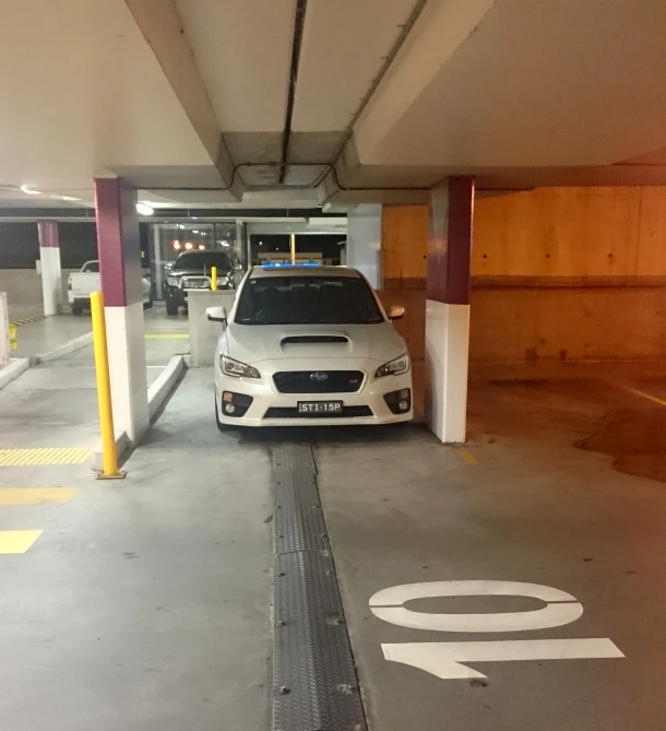 a car is parked in the station for passengers