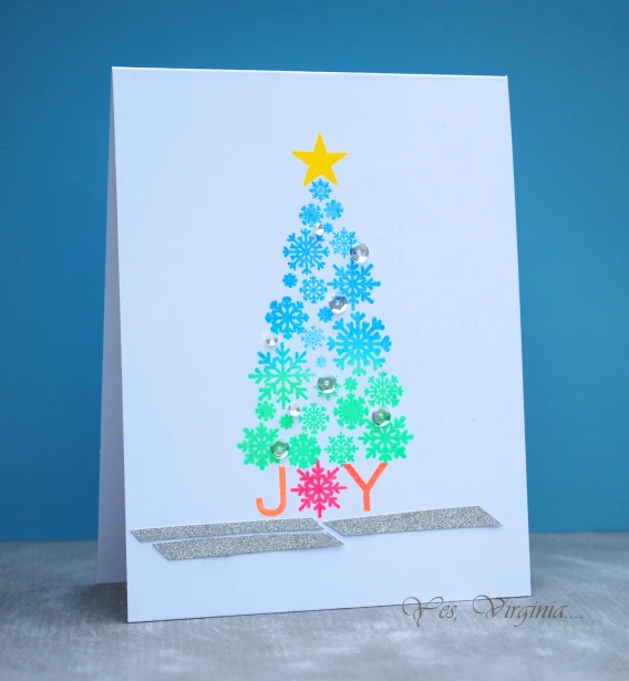this is a brightly colored christmas tree on white paper