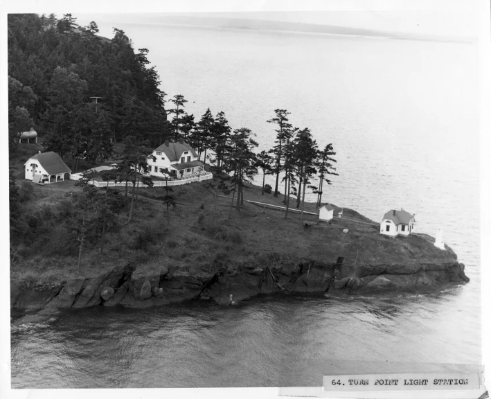 this is an old black and white po of some small houses