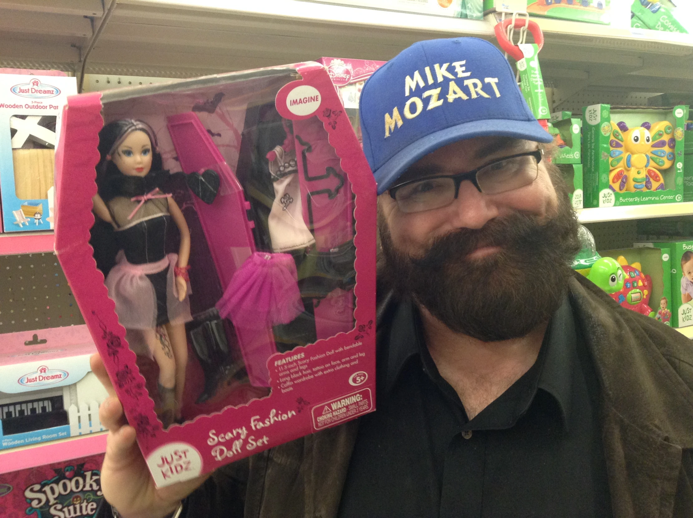 a man with a doll in a toy store
