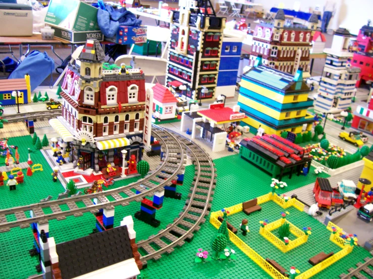 many different models of buildings and a train on a track