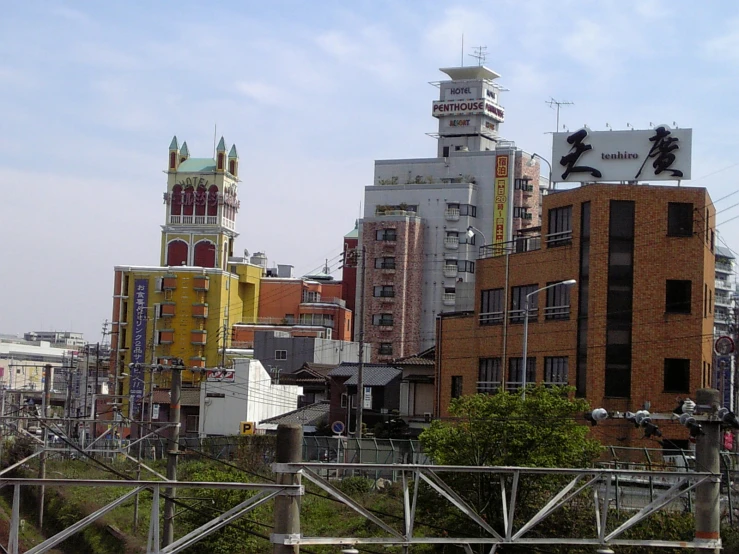 an image of several buildings and spires near one another