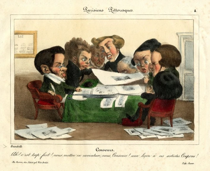 several politicians sitting around a desk with documents