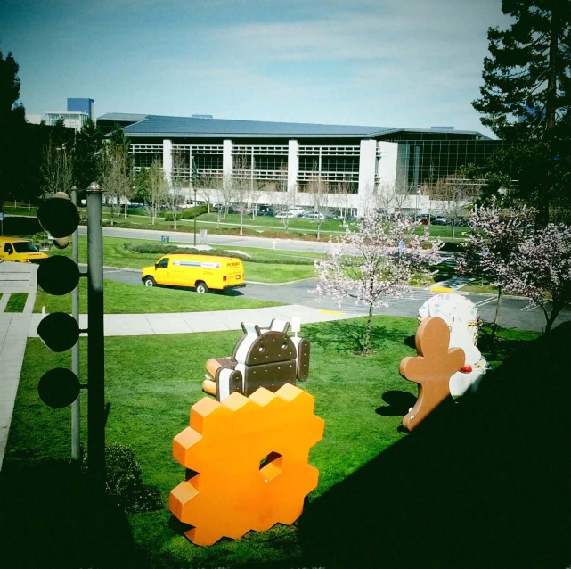 a group of large sculptures in the middle of a lawn