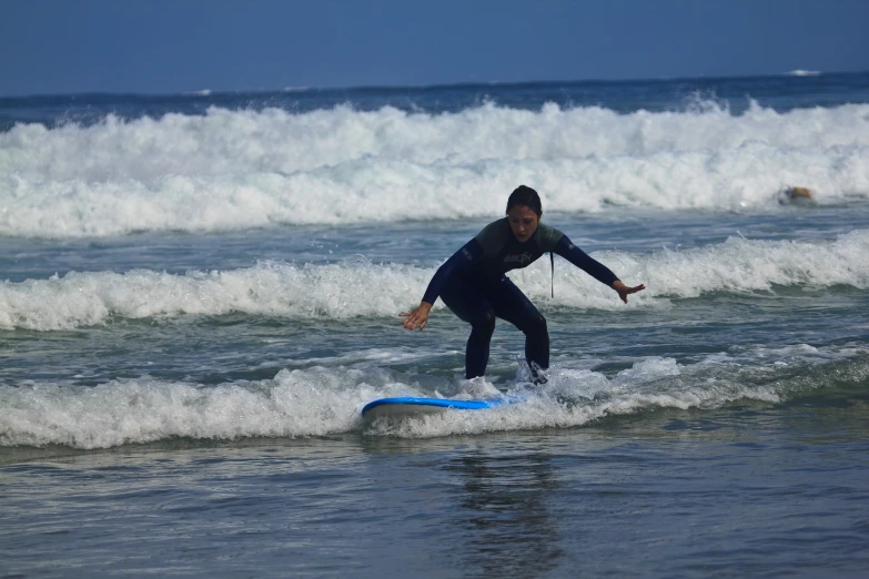 a man is riding a surfboard on the water