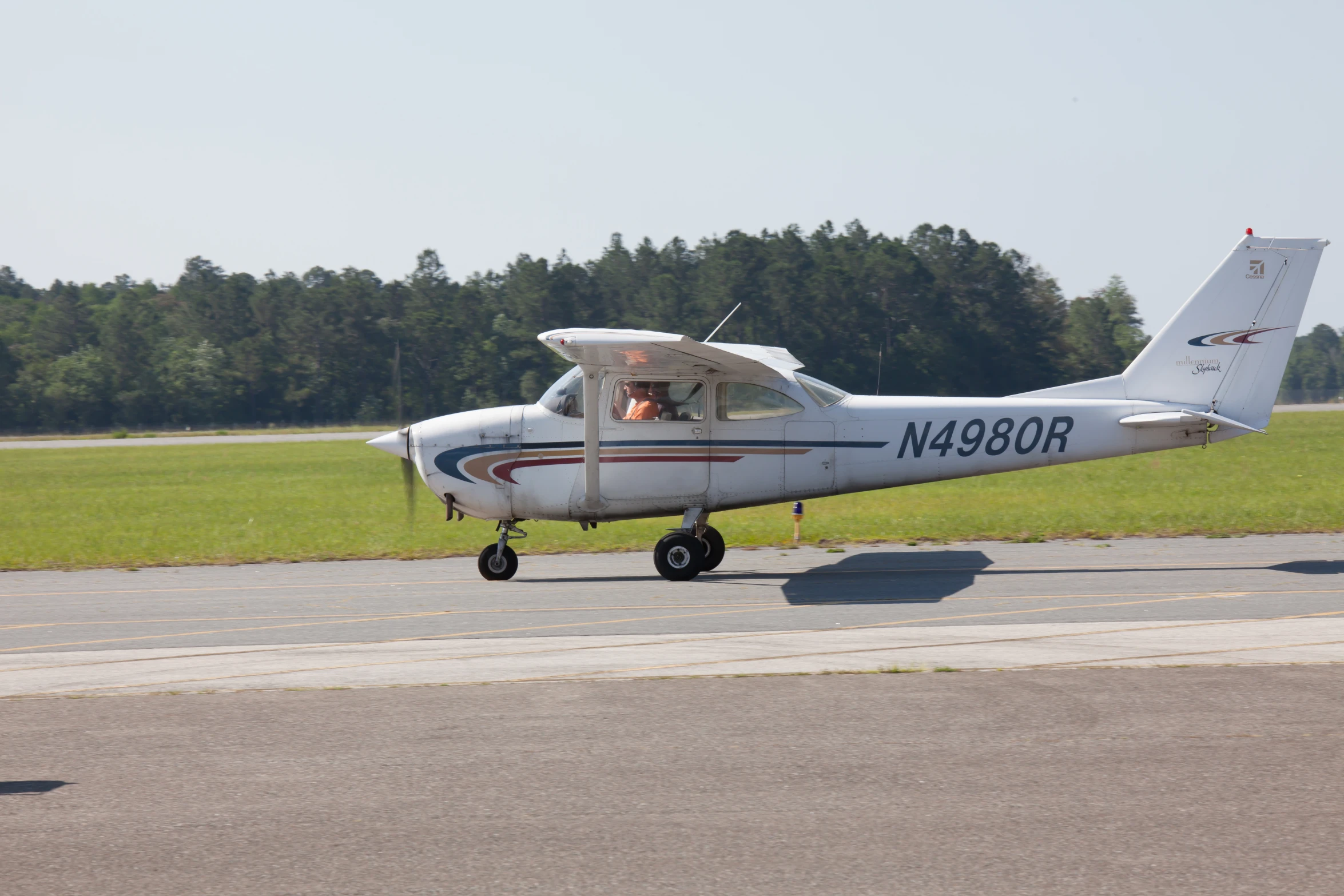 a small airplane is sitting on the runway