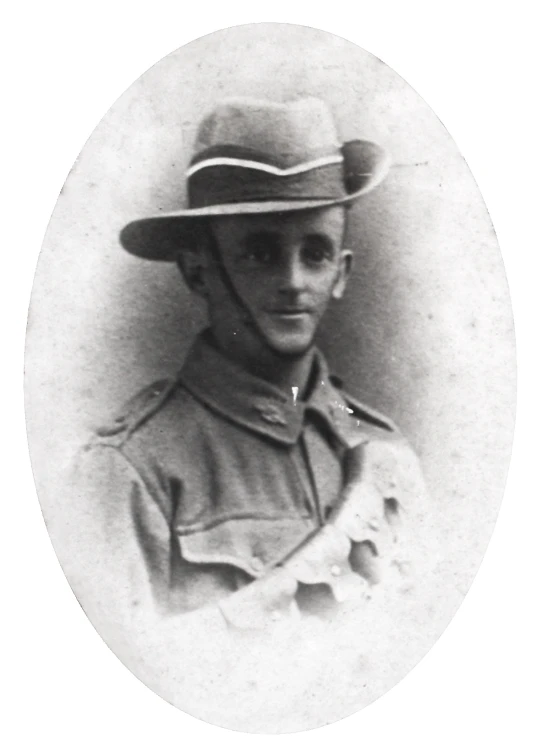 old pograph of a man with hat and uniform