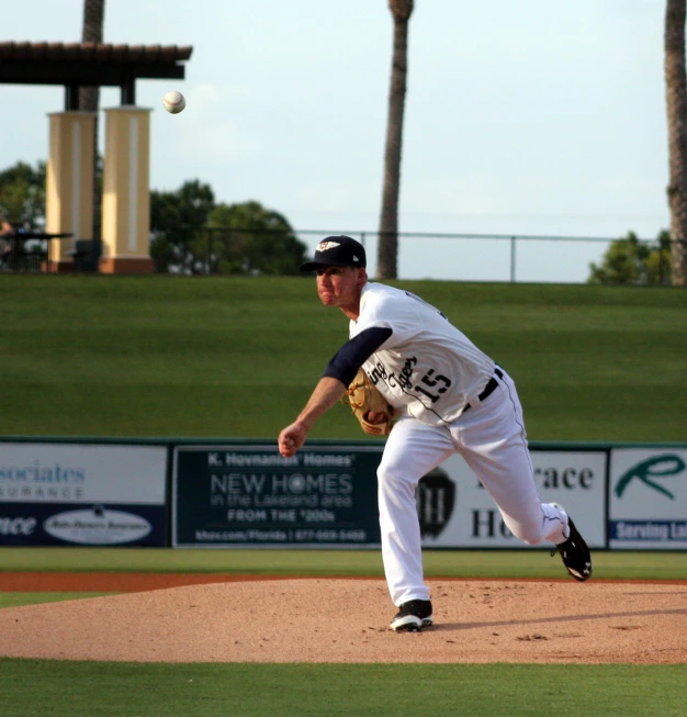 the baseball player is getting ready to throw the ball