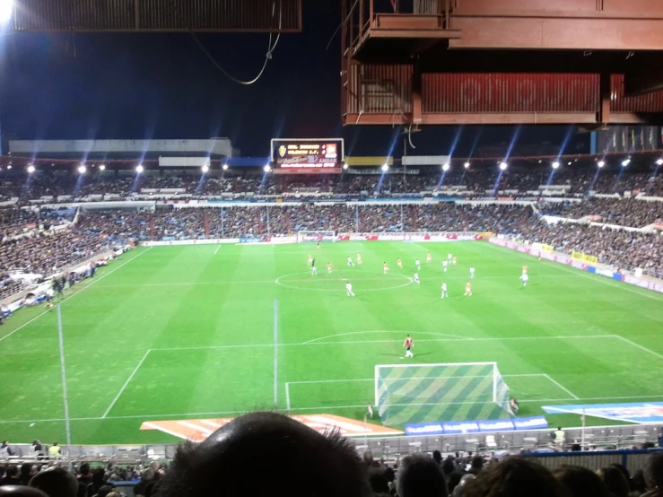 an overhead view of a soccer field in the evening