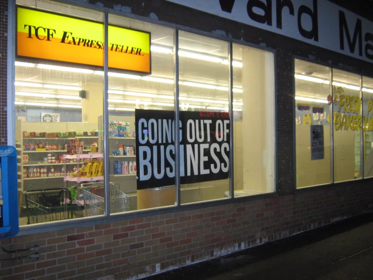 there is a sign advertising businesses for their business