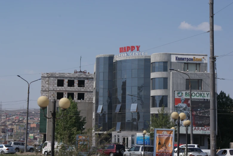 a city is filled with large buildings and shops