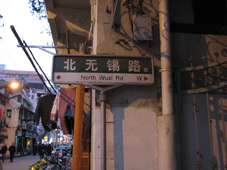 a street sign is shown near a sidewalk