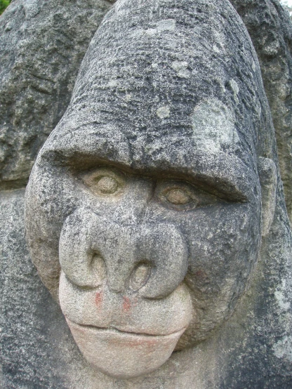 closeup of face of statue carved of stone