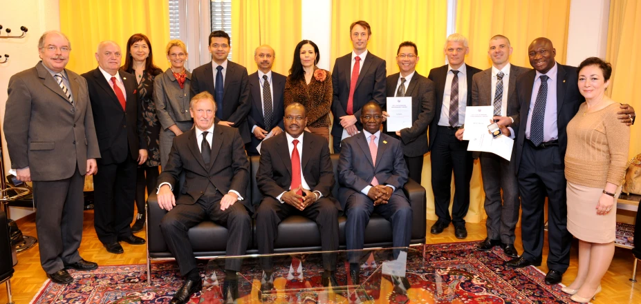 a group of people standing and posing together