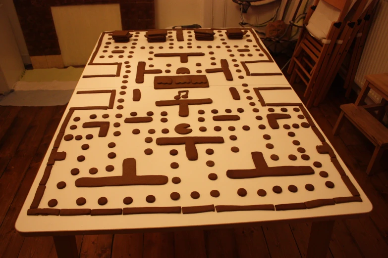 a cake shaped like a game is sitting on a table