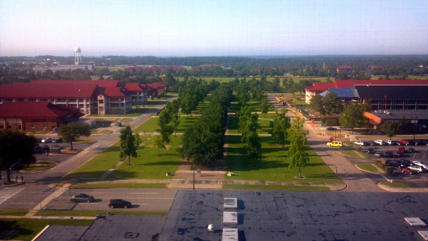 an aerial view of a parking lot in a city