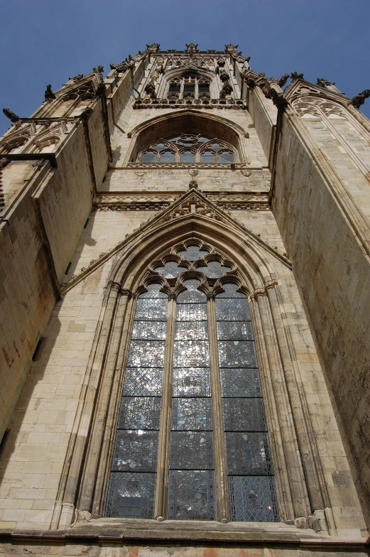 large stone cathedral on a clear day with blue sky