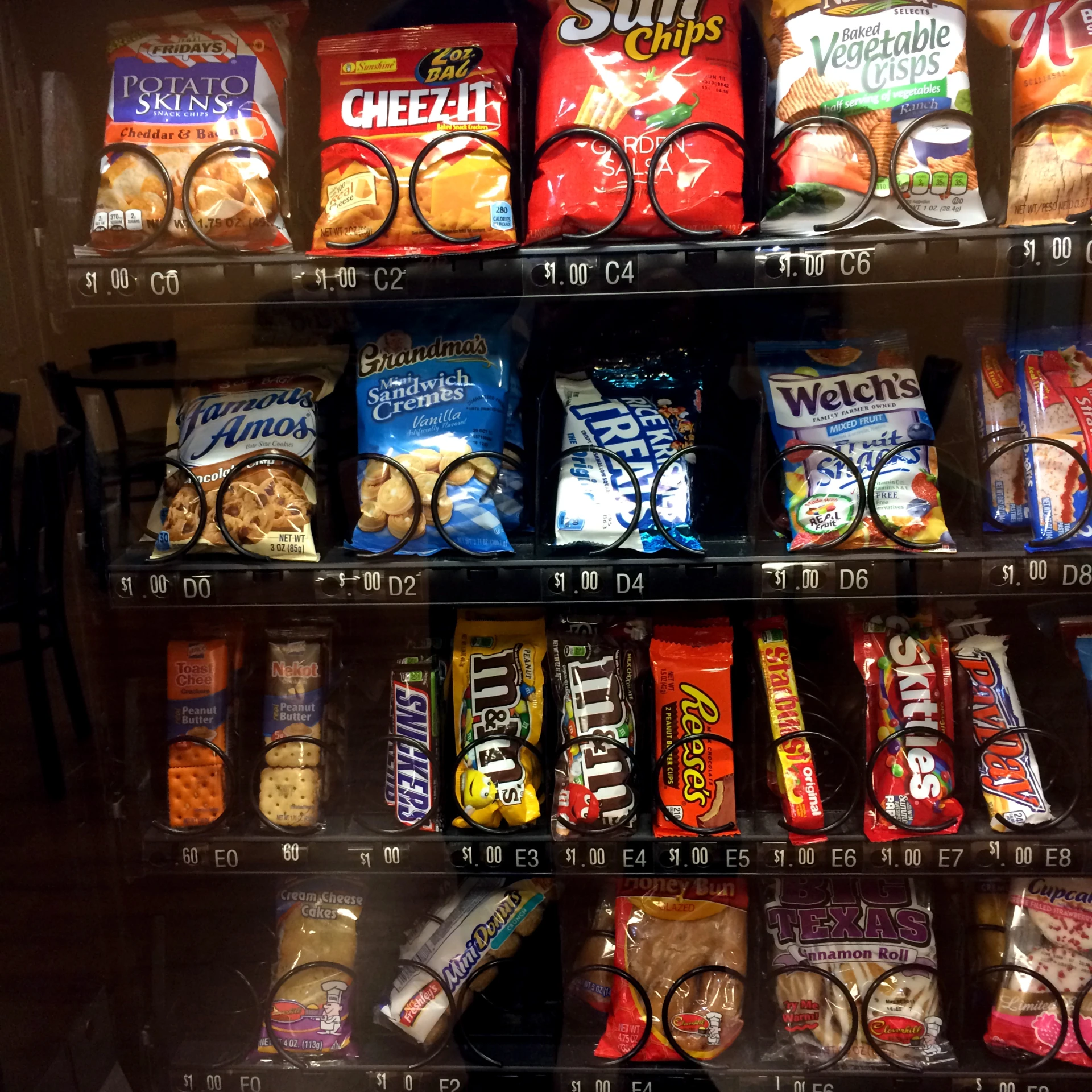 a vending machine with a lot of snacks on it