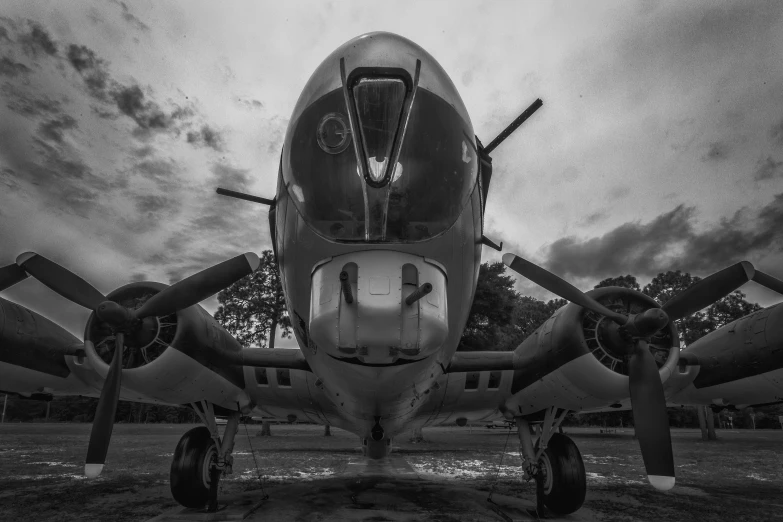 a black and white po of the front end of a plane