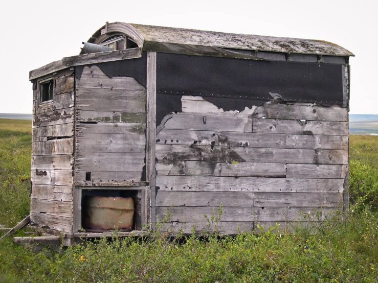 a broken out building in the middle of nowhere