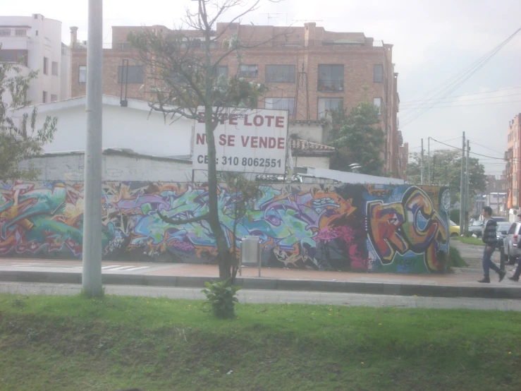 a large building with lots of graffitti on the outside
