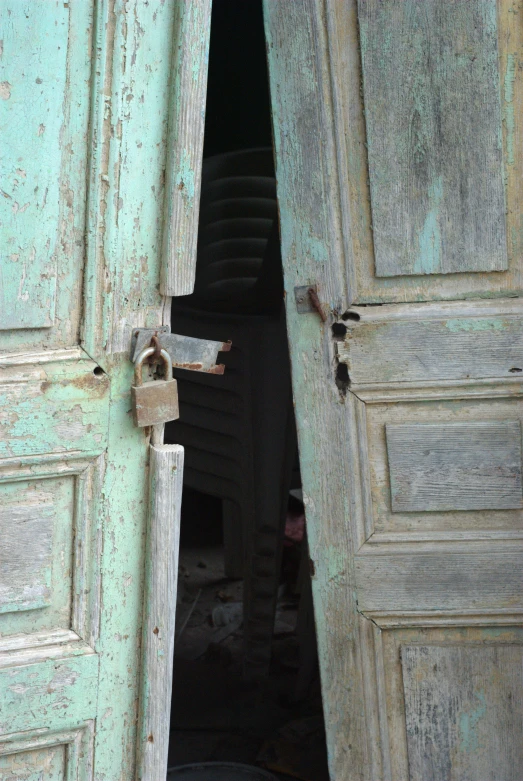 close up of doors with metal ring handles