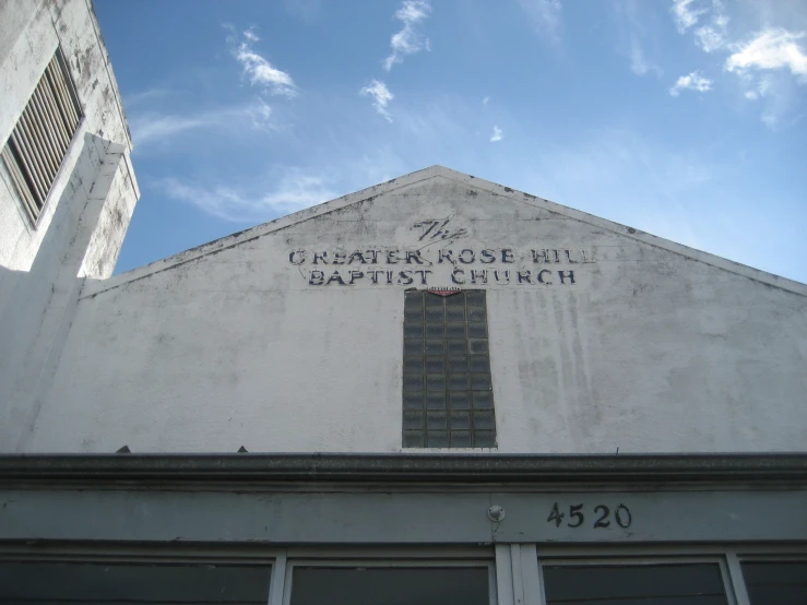 a building with an outside chapel written below it