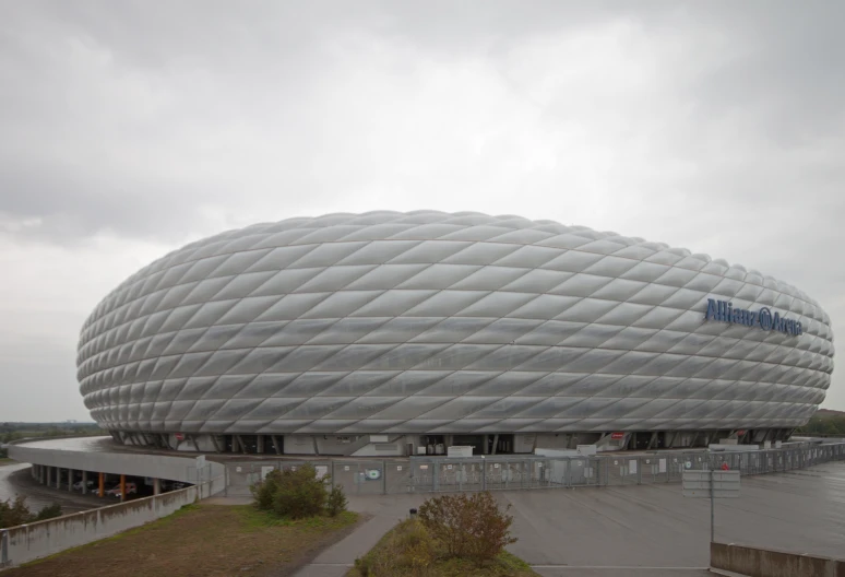 a huge, domed building stands near the ocean