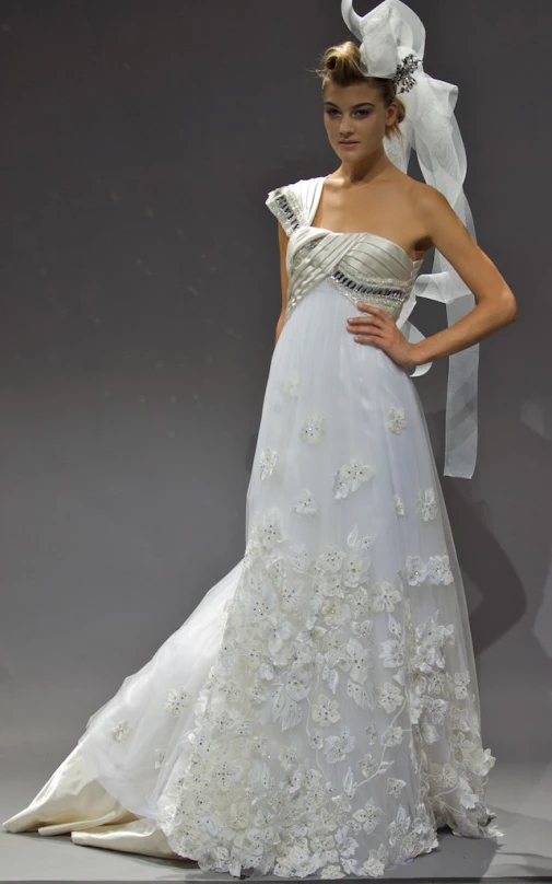 an elegant wedding dress with petals and embellishments