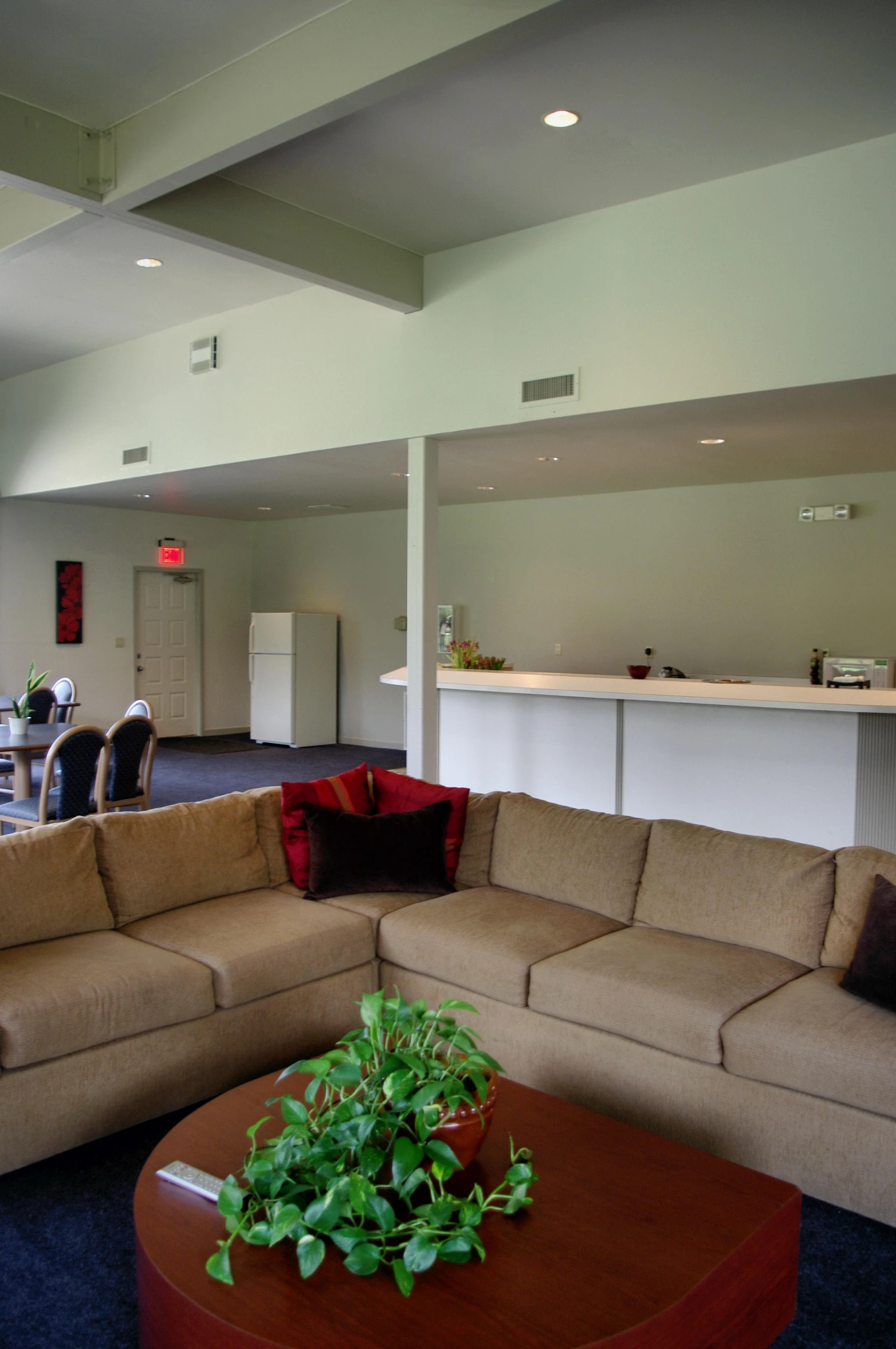 a living room with furniture and decor inside