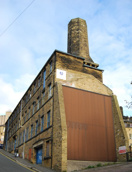 the old factory building is near the street corner