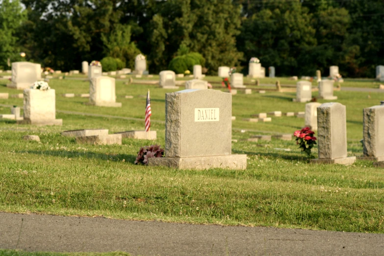 the headstones of people in a cemetery