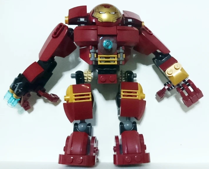 an action figure made out of lego parts and with a large helmet on top