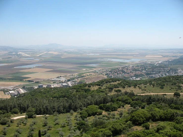 view of an aerial city from a mountain