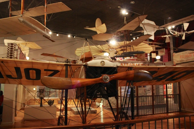 the old fashioned model of an airplane is on display