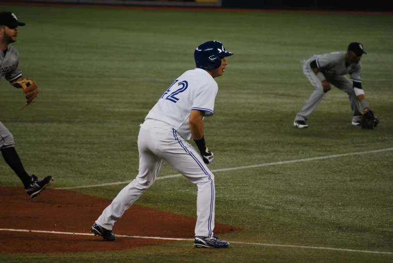 a couple of baseball players are playing some games