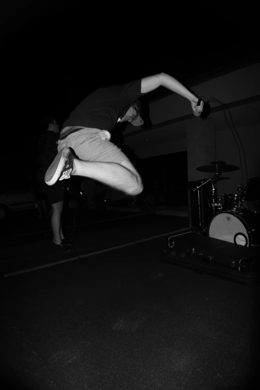 a man flipping upside down on a skateboard