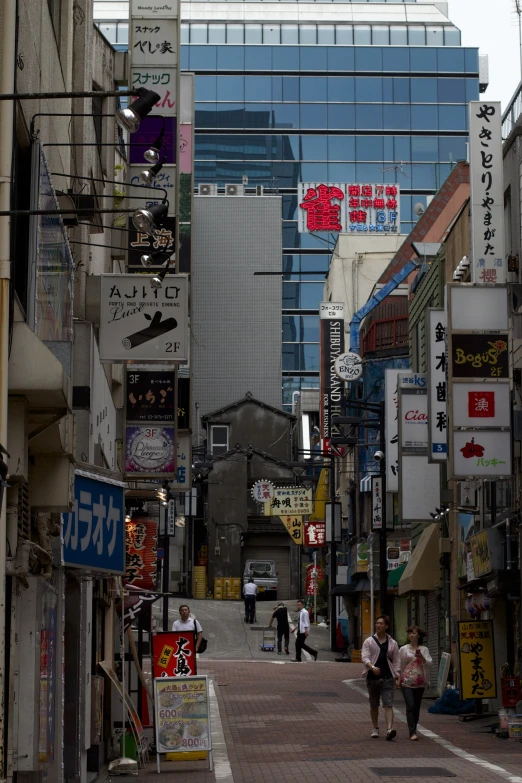 the street has many signs all around it