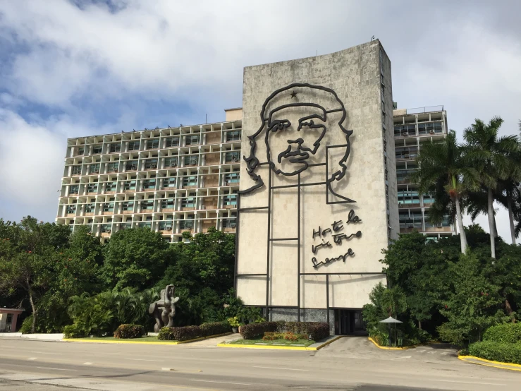 a large building that has a picture of a man on it