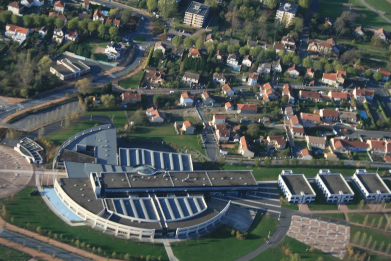 an aerial view of several buildings in a residential area